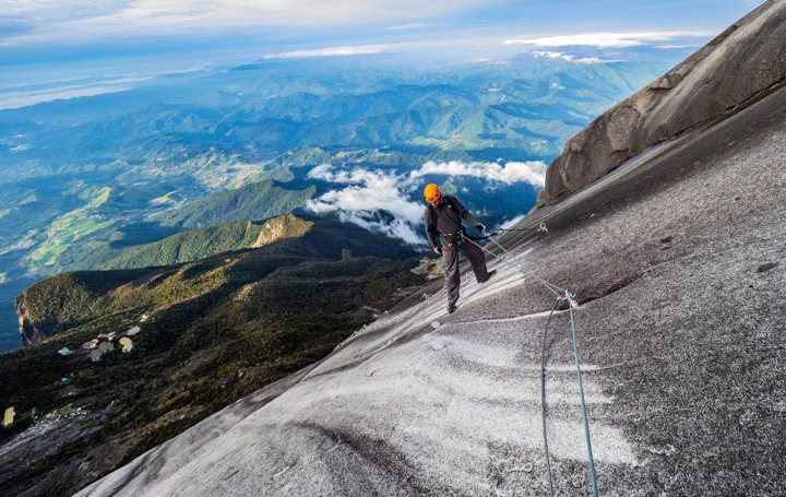 Climber on the Via Ferrata route on Mount Kinabalu, Sabah