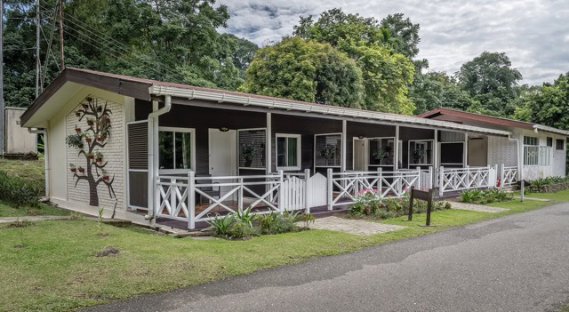 Exterior of a Kelicap twin-share cabin at Poring Hot Springs, Sabah